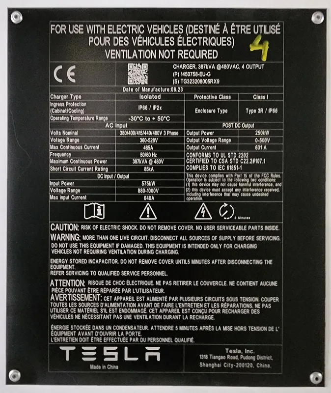 A Tesla at a Supercharger